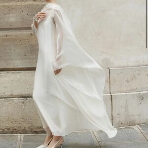 Elegant White Flowing Dress